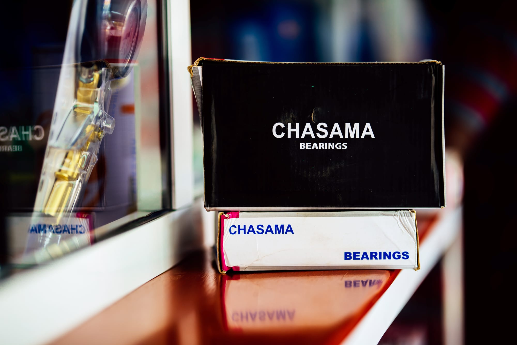 Boxed Chasama bearings on a showroom shelf